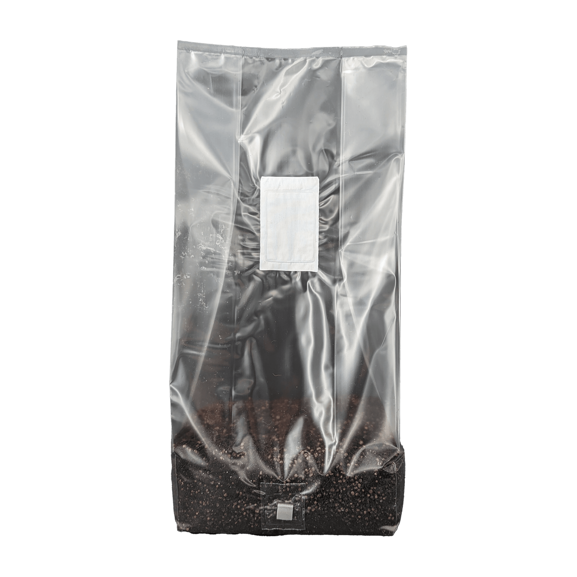 Tall standing transparent bag of 5 pounds Spawn Magic All-In-One Mix, clear view of substrate mix at the bottom, isolated on a neutral background.